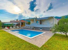 Family-Friendly Holiday Home with Private Pool, Playground, and BBQ