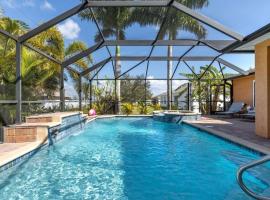 Tranquil Palms Heated Pool Spa Outdoor TV & More – hotel w mieście Cape Coral