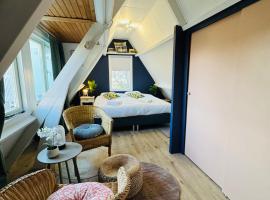 Hello Noordwijk - Tiny House Dahliastraat 60, μικροσκοπικό σπίτι σε Noordwijk aan Zee