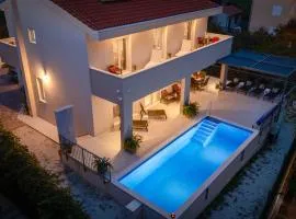 Villa Leonore in Omis with 4 en-suite bedrooms, heated pool, PS5, completely fenced yard & just 3min walk from sandy beach