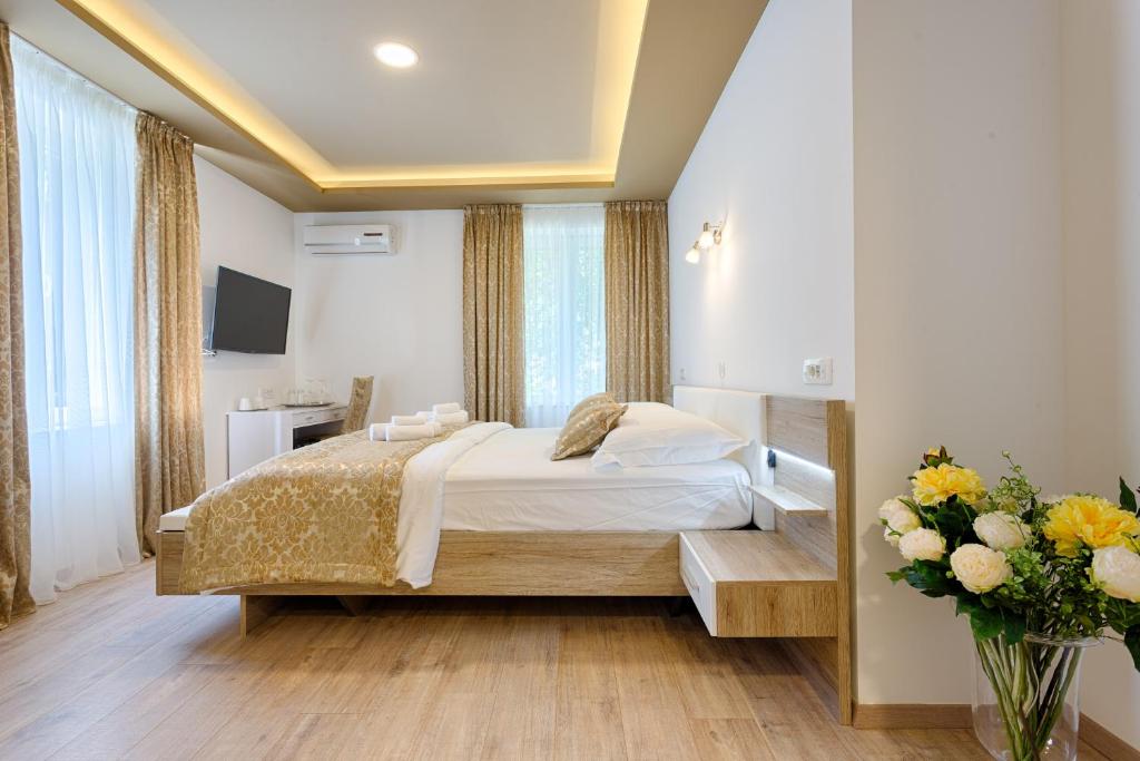 Krevet ili kreveti u jedinici u objektu Luxury Rooms Floramye