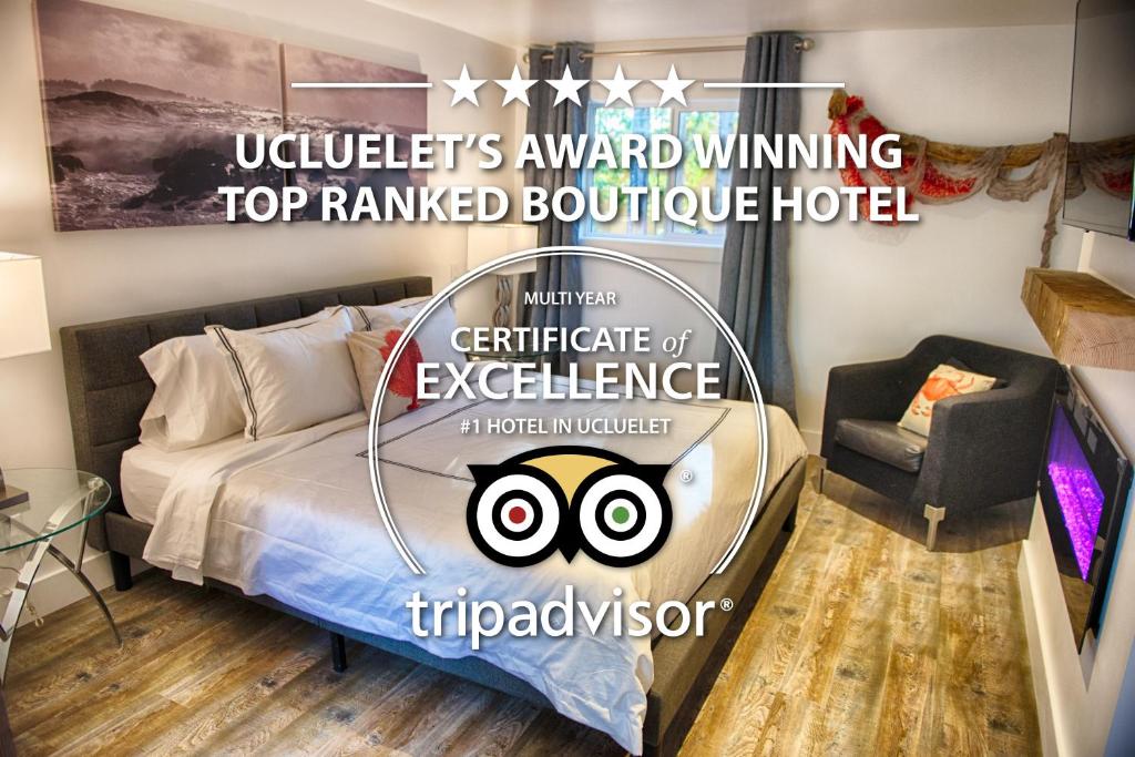 a bedroom with a bed with a sign that reads universitys award winning top ranked at The Francis Boutique Inn in Ucluelet