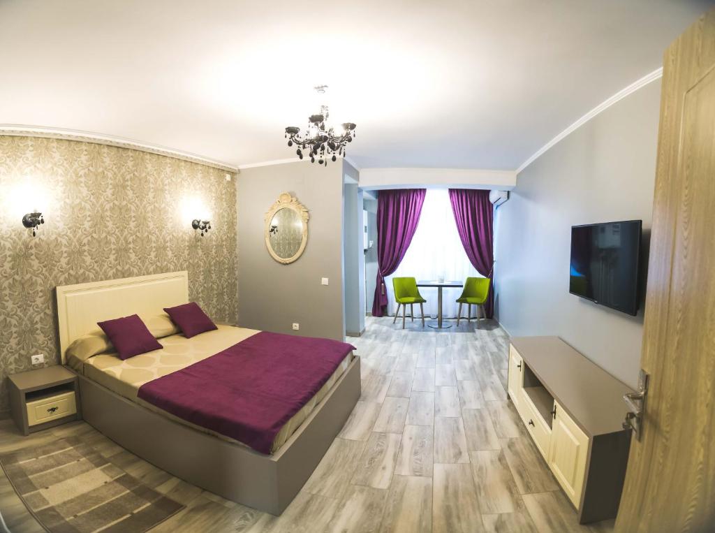 Krevet ili kreveti u jedinici u okviru objekta Holiday Apartments