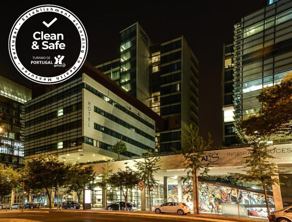 a building with a sign that reads clean and safe at VIP Executive Arts Hotel in Lisbon