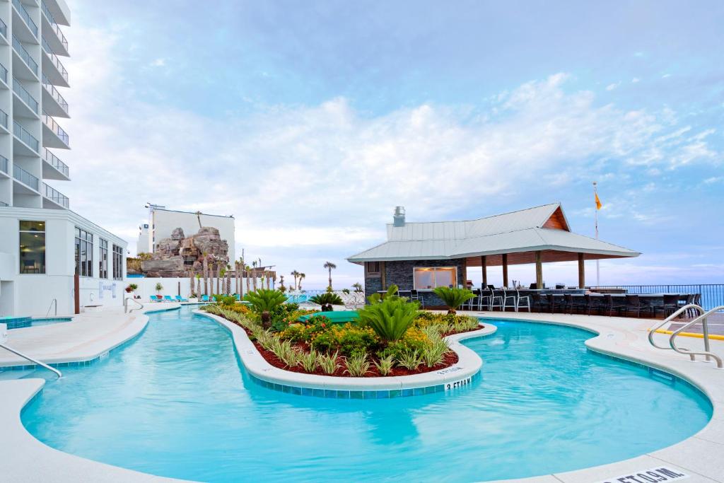 Piscina de la sau aproape de Holiday Inn Express & Suites Panama City Beach Beachfront, an IHG Hotel