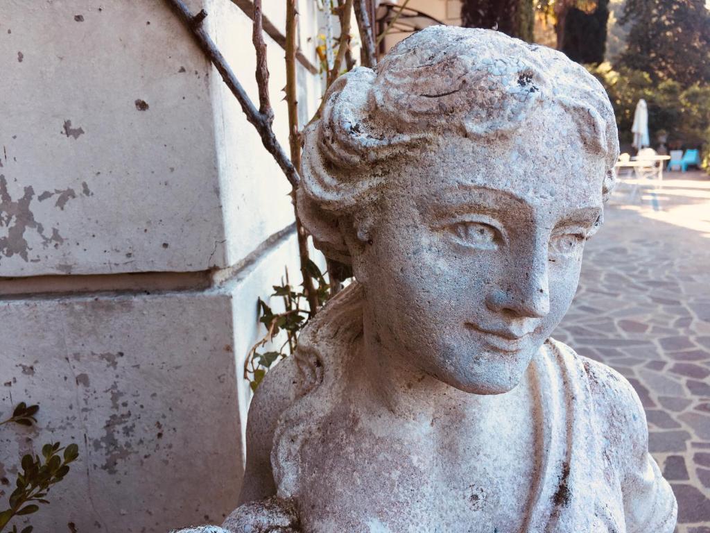 a statue of a bust of a woman at Villa Varenna in Varenna