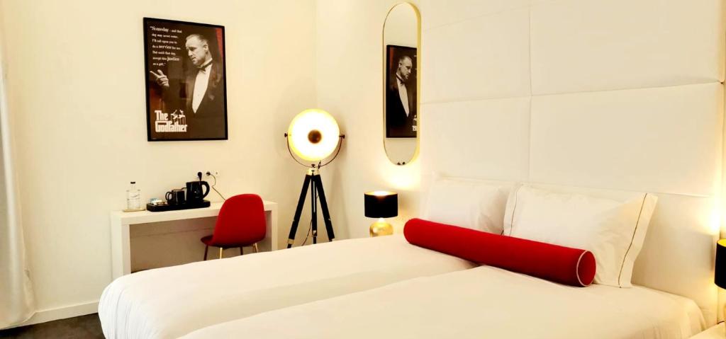 Ліжко або ліжка в номері Lisbon City Hollywood Hotel by City Hotels