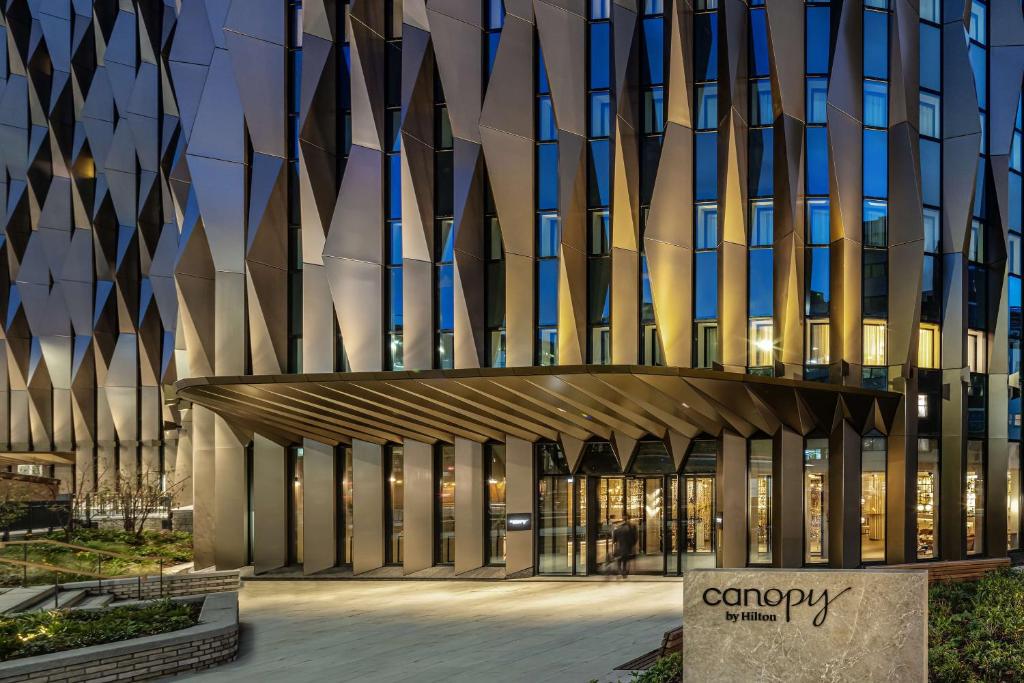 a rendering of the entrance to a building at Canopy by Hilton London City in London