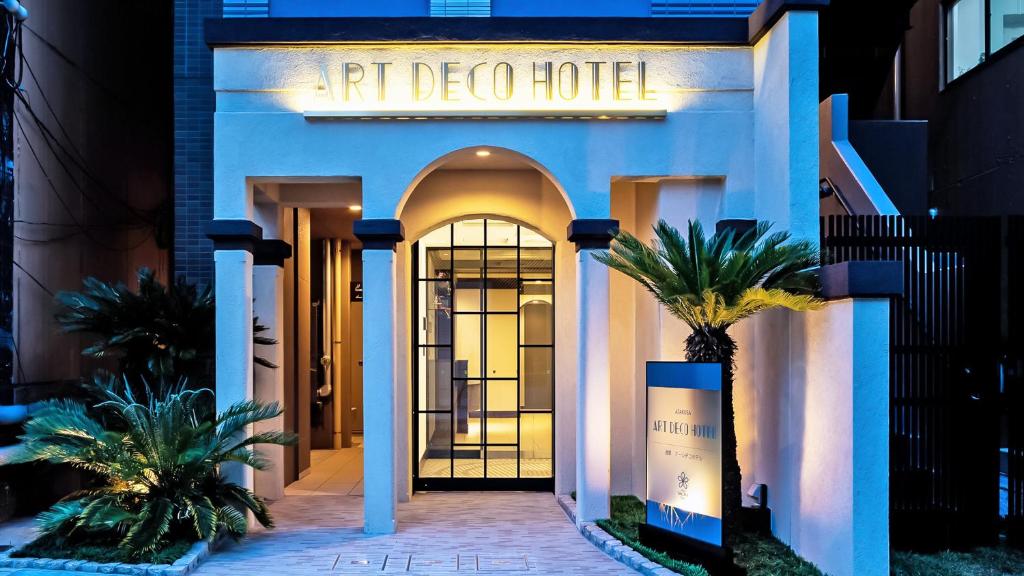 a hotel entrance with a sign that reads art deco hotel at Stay SAKURA Tokyo ASAKUSA ART DECO HOTEL in Tokyo