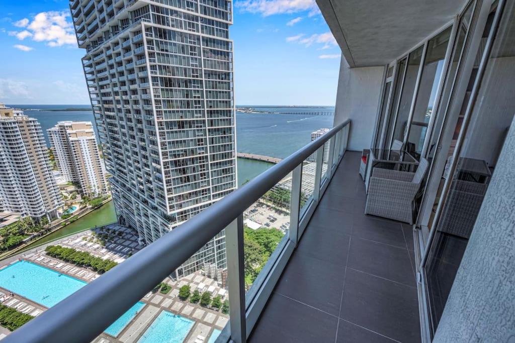 a balcony with a view of the ocean from a building at Icon Luxury 34th Floor Amazing Oceanview, Brickell in Miami