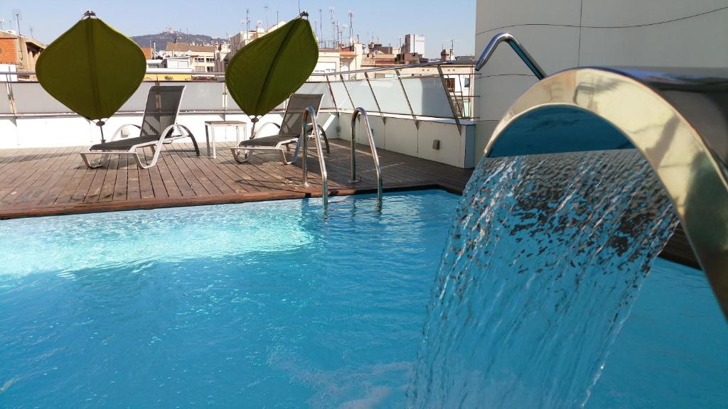 The swimming pool at or close to Ako Suites Hotel