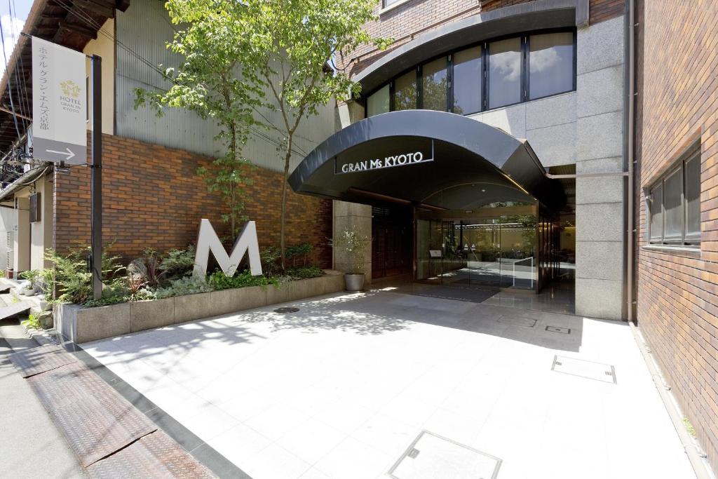 a entrance to a building with a sign on it at Hotel Gran Ms Kyoto in Kyoto