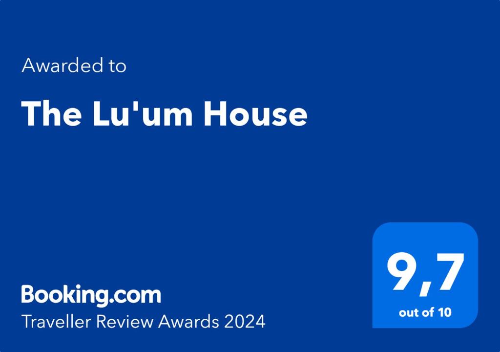 een blauw bord dat het Luhm huis leest bij The Lu'um House in Tuxtla Gutiérrez