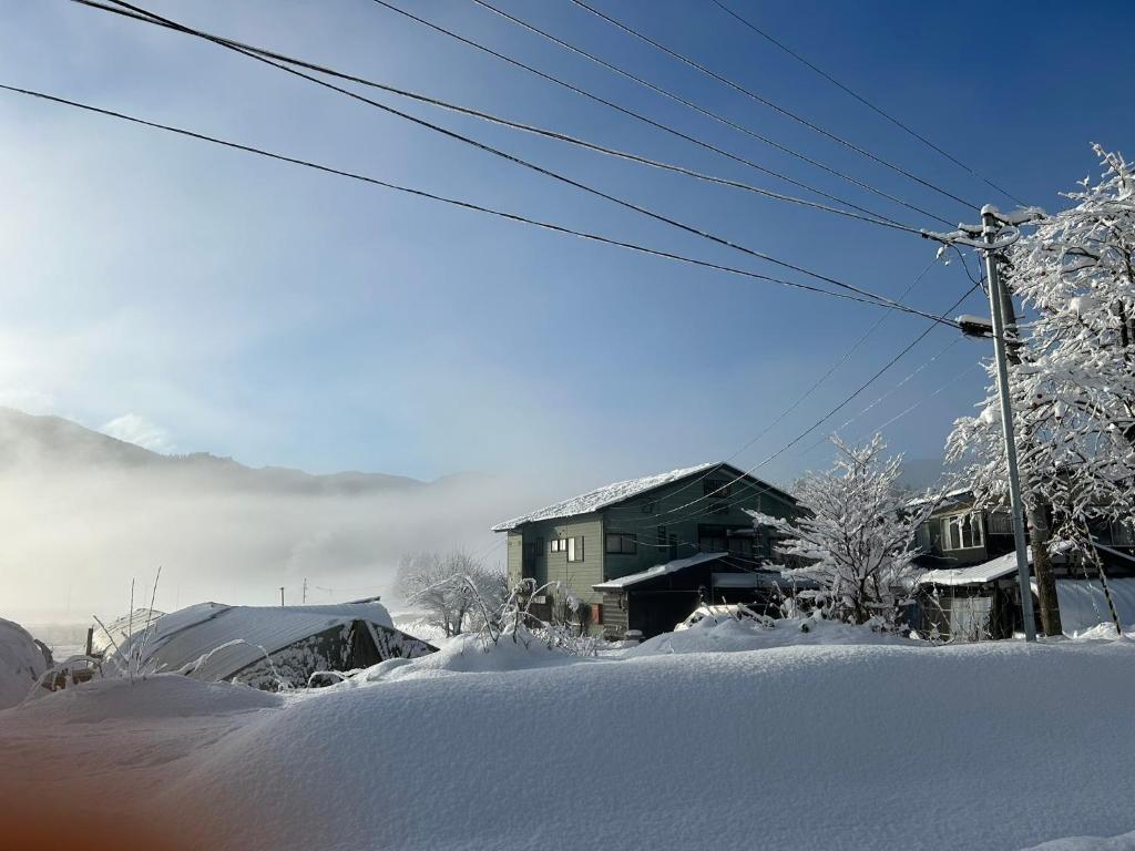 Farm Inn Seisetsukan during the winter