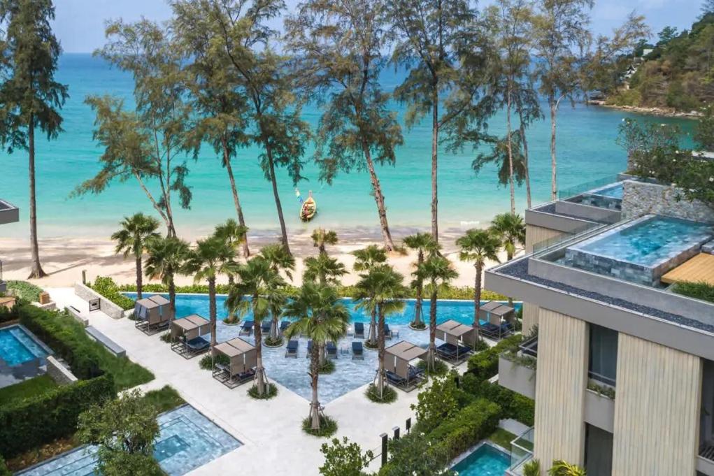 an aerial view of the resort with the beach in the background at Twinpalms MontAzure Phuket Resort in Kamala Beach