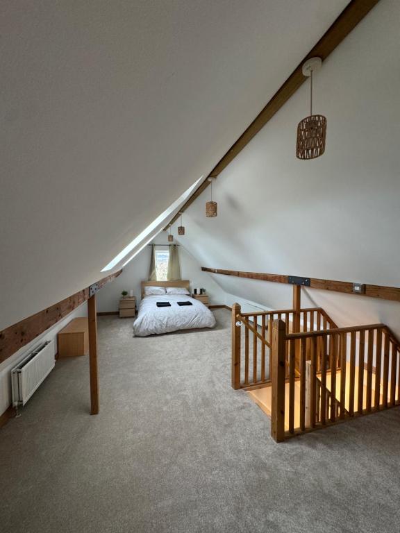 A bed or beds in a room at Bath City Cottage