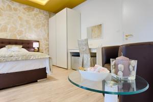 Krevet ili kreveti u jedinici u objektu Luxury Rooms Floramye