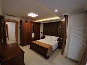 Giường trong phòng chung tại Taksim Flat