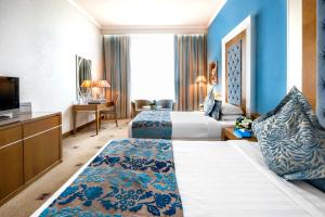 Cama ou camas em um quarto em Marina Byblos Hotel