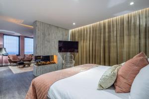 Rúm í herbergi á Van der Valk Hotel Utrecht