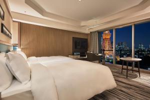 Cama ou camas em um quarto em The Prince Park Tower Tokyo - Preferred Hotels & Resorts, LVX Collection