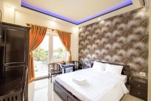 Giường trong phòng chung tại An Phat Hotel