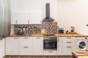 A kitchen or kitchenette at Apartment Mille