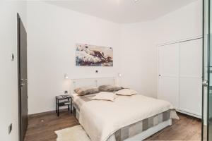 A bed or beds in a room at Apartment Mille