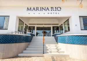 a hotel with stairs leading up to a marmite hotel at Hotel Marina Rio in Lagos