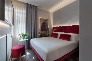 Postel nebo postele na pokoji v ubytování Hotel Milano & SPA***S