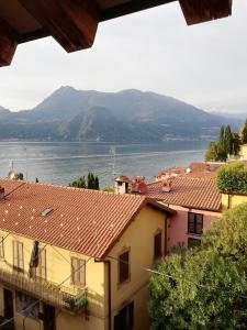 a view of a city and a body of water at Albergo Del Sole in Varenna