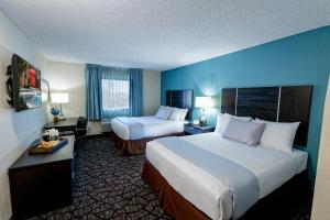 Uma cama ou camas num quarto em Silver Sevens Hotel & Casino