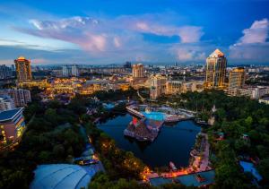 an aerial view of a city at night at Sunway Resort Hotel in Kuala Lumpur