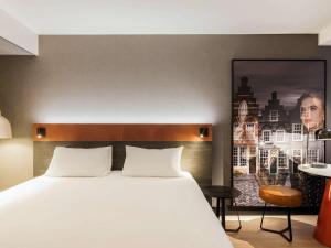 Ένα ή περισσότερα κρεβάτια σε δωμάτιο στο Mercure Amsterdam City Hotel