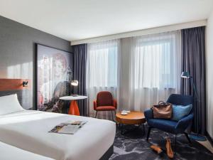 Ένα ή περισσότερα κρεβάτια σε δωμάτιο στο Mercure Amsterdam City Hotel