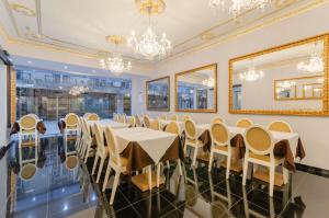 a conference room with a long table and chairs at Hotel LX Rossio in Lisbon