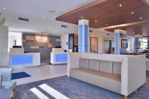 A seating area at Holiday Inn Express & Suites - Olathe West, an IHG Hotel