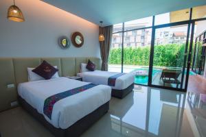 Легло или легла в стая в Good Night Pool Villa Phuket - SHA Plus