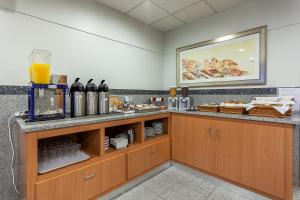 A kitchen or kitchenette at Residencial Horizonte