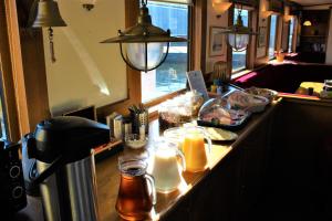 a bar with food and drinks on a counter at Felicitas in Amsterdam