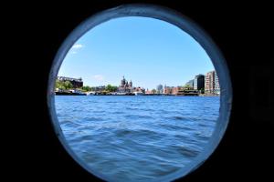 a view of a body of water from a boat at AmicitiA in Amsterdam