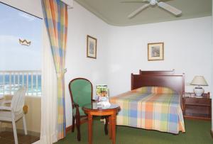 Tempat tidur dalam kamar di Hotel Riu Oliva Beach Resort - All Inclusive