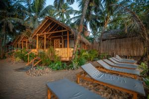 Jardí fora de Goa Cottages Agonda