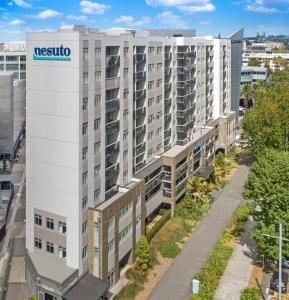 an aerial view of a building with the usosota logo on it at Nesuto Stadium in Auckland