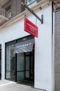 a sign for a merrett hotel on the side of a building at Herbert Hotel in San Francisco