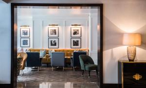 a dining room with a table and chairs at The Marylebone Hotel in London