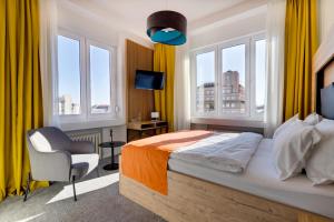 Krevet ili kreveti u jedinici u objektu Bed & Breakfast Sky City Center