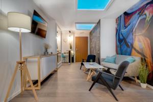 TV i/ili zabavni centar u objektu Bed & Breakfast Sky City Center