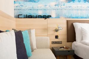 Un lugar para sentarse en Sunprime C-Lounge - Adult Only