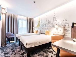 Krevet ili kreveti u jedinici u okviru objekta ibis Styles Lublin Stare Miasto